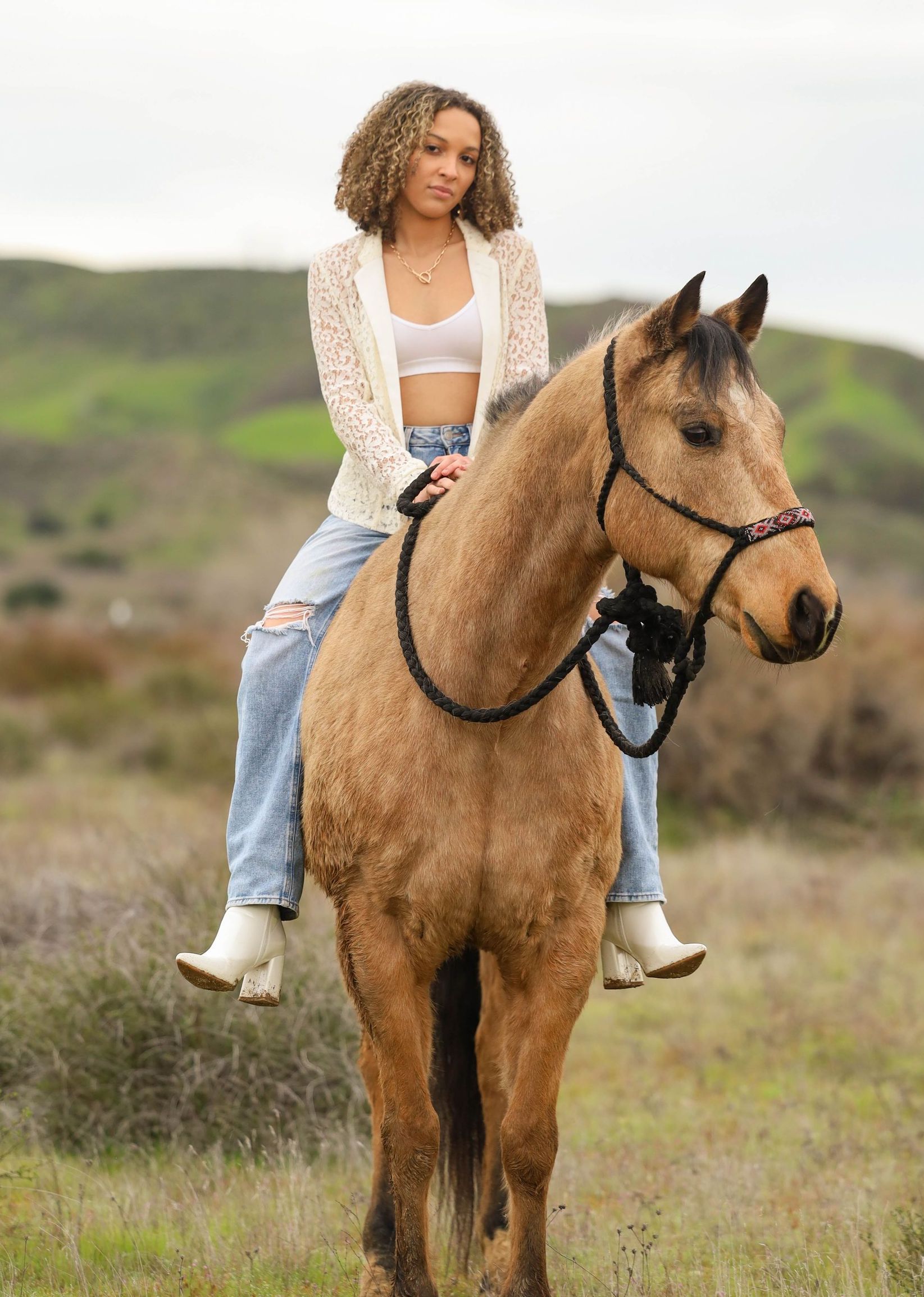 girl sitting on horse