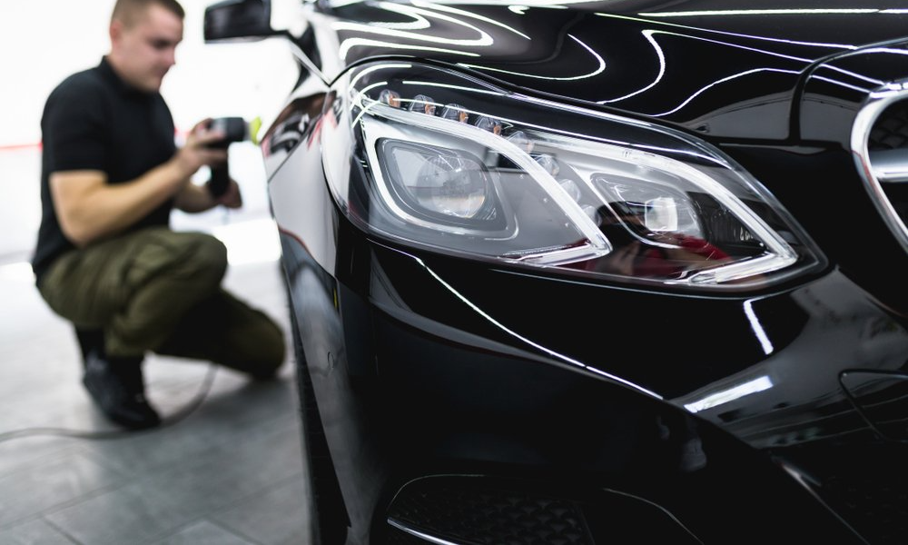 A Worker Polishing Car Door - Dent Repairs in Coffs Harbour