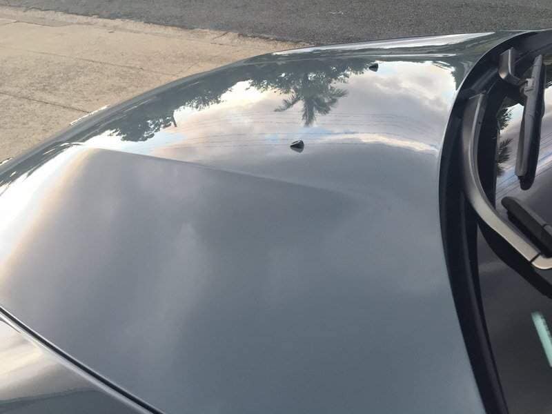 Front Bonnet Black Car After Hail Damage Dent Removal — Dent Magic in Coffs Harbour, NSW