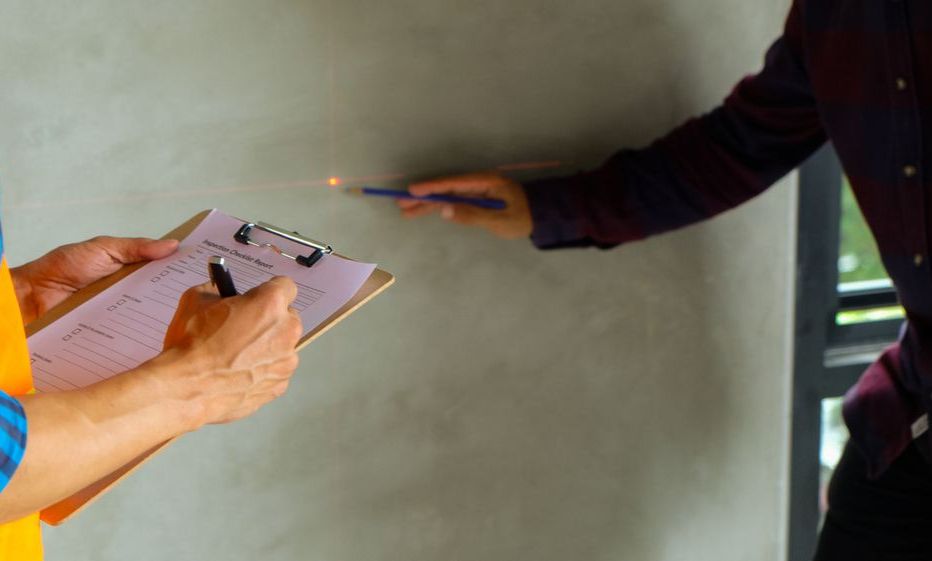 A Building Inspection Being Done On A Building — Barling Constructions in Casino, NSW