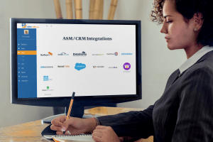 Businesswoman using a computer with RatesCalc on the monitor