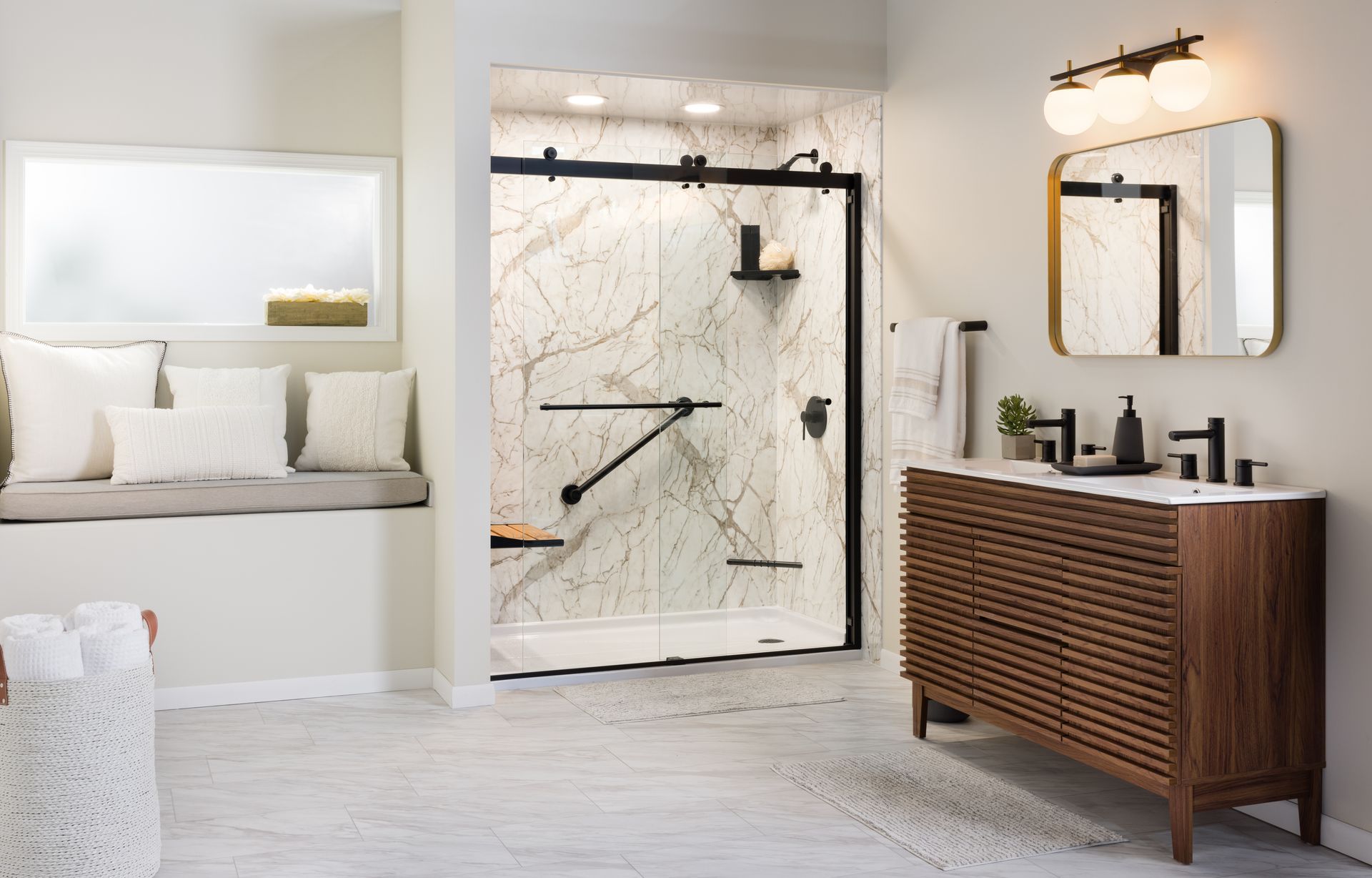 Modern bathroom with black framed glass shower and wood vanity