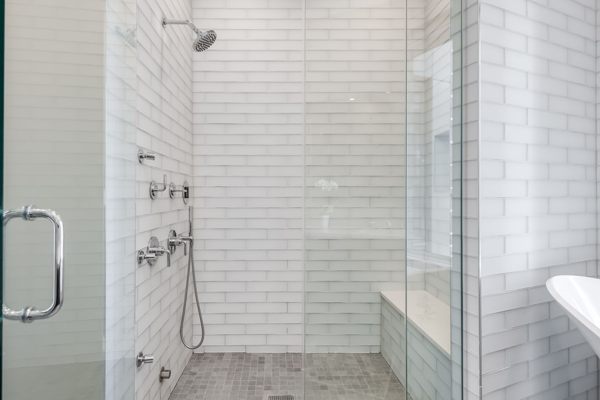 Custom walk-in shower with white subway tile surround Custom walk-in shower with white subway tile surround