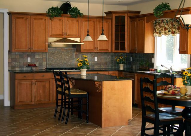 Wood Kitchen Remodel by Tailored Roofing and Remodeling Inc. project photo 2