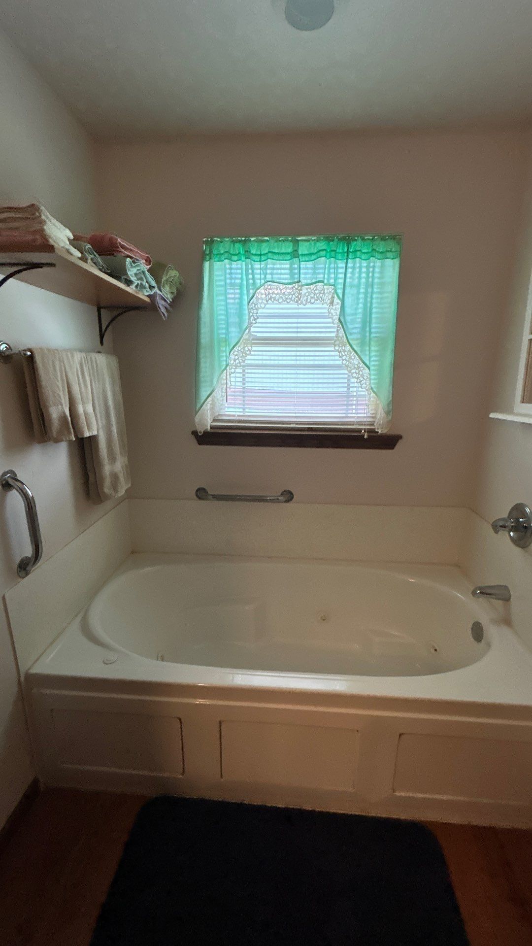 White built-in bathtub in a residential bathroom