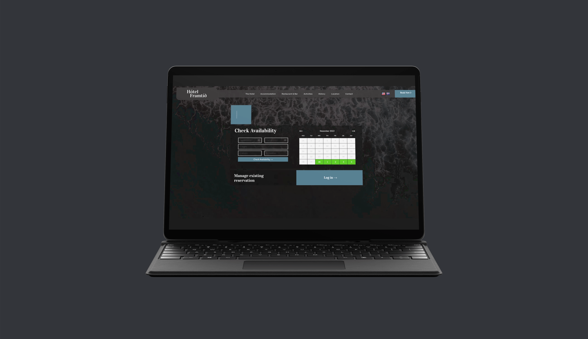 A laptop computer is open to a hotel booking website on a black ocean background.
