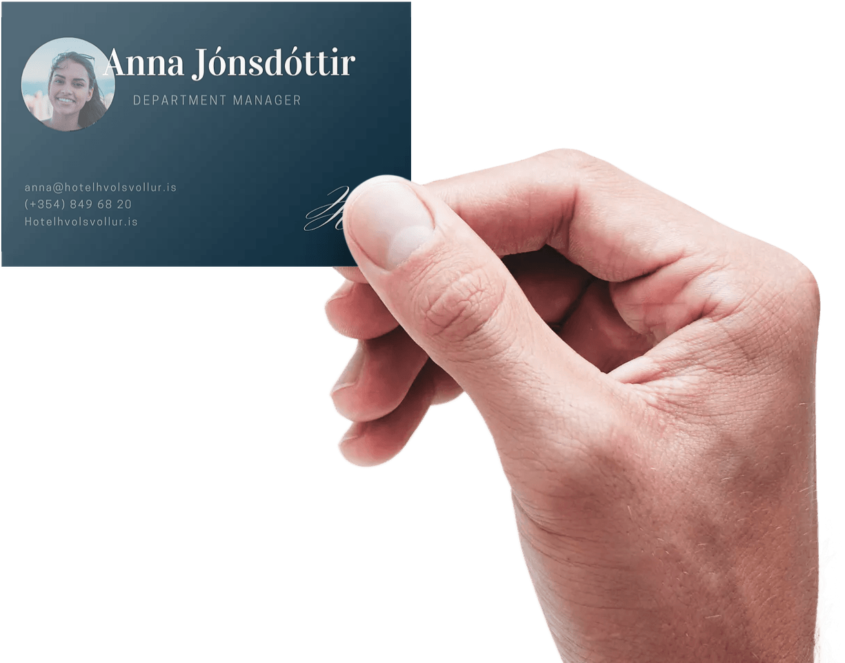 A hand is holding a business card for anna jonsdottir