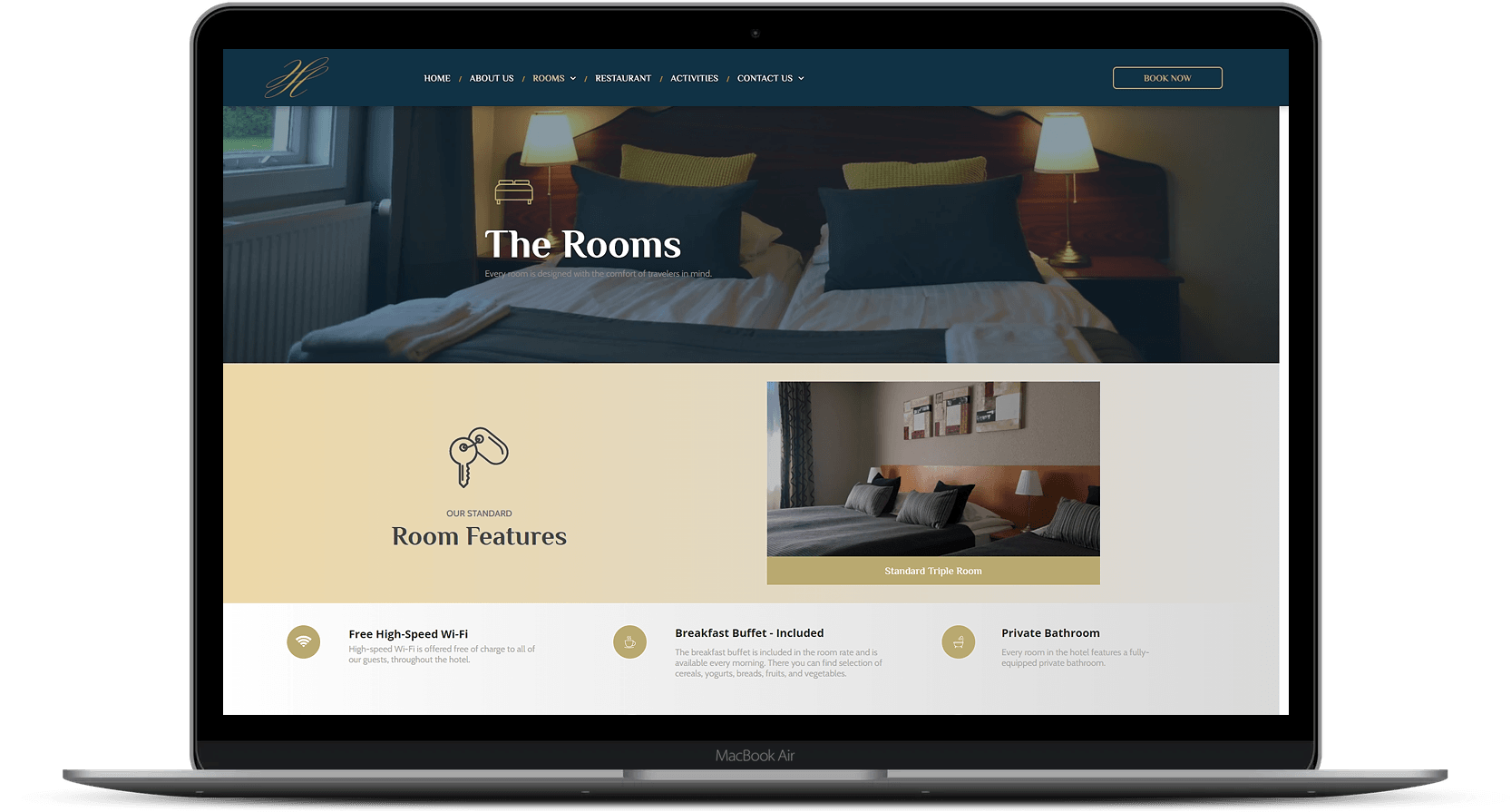 A laptop computer is open to a hotel website.