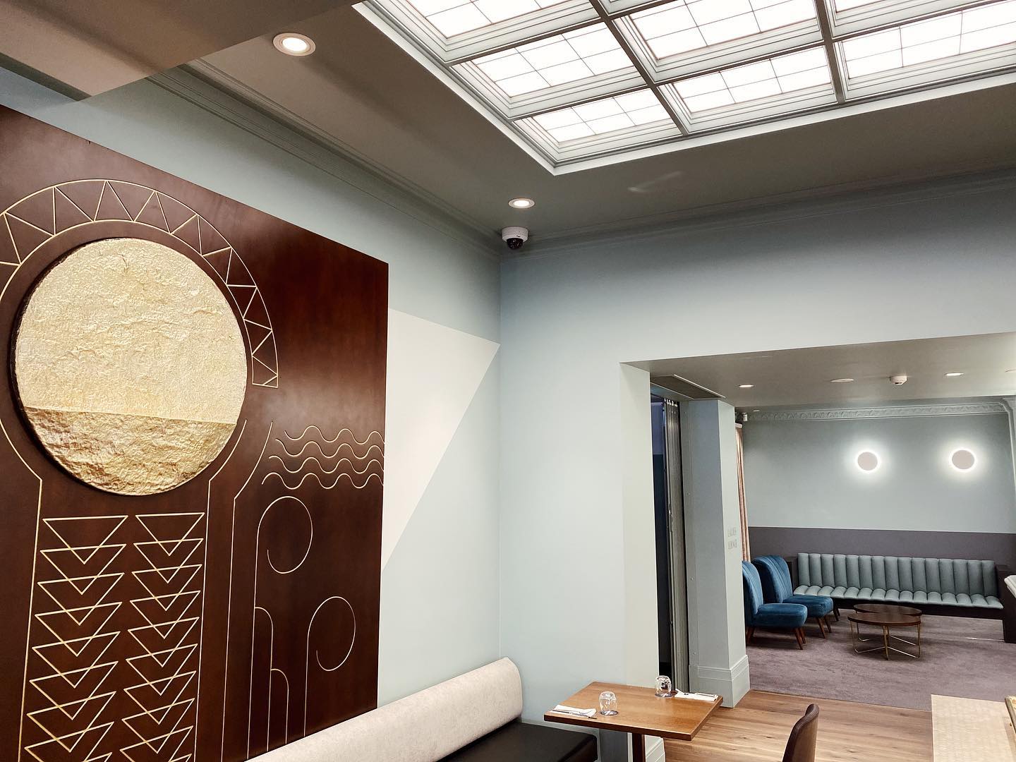 Office lounge with sofa and table — Security Systems in Armidale, NSW