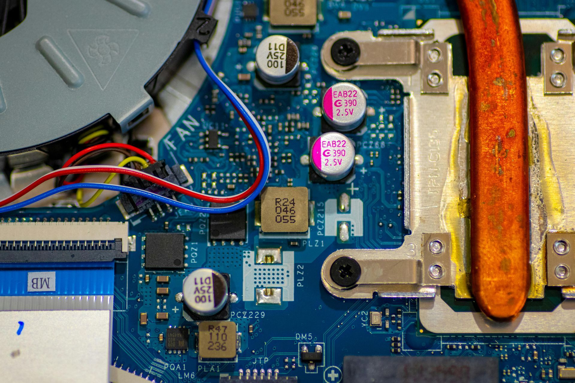 A close up of a computer motherboard with the word fan on it