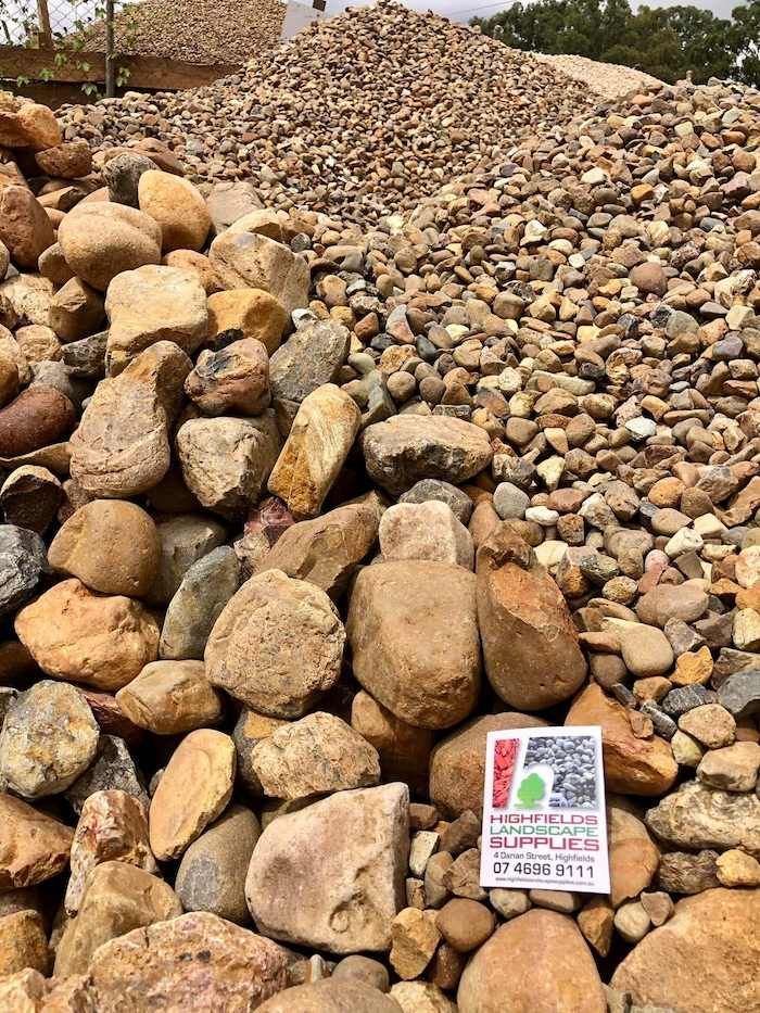 A Pile of Rocks With a Sign on Top of Them — Highfields Landscape Supplies In Meringandan, QLD