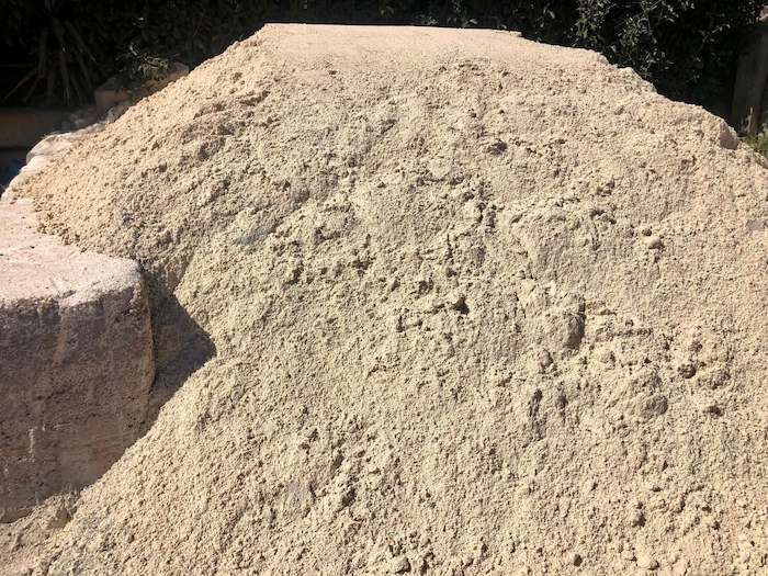 A Pile of Sand is Sitting on Top of a Rock — Highfields Landscape Supplies In Dalby, QLD