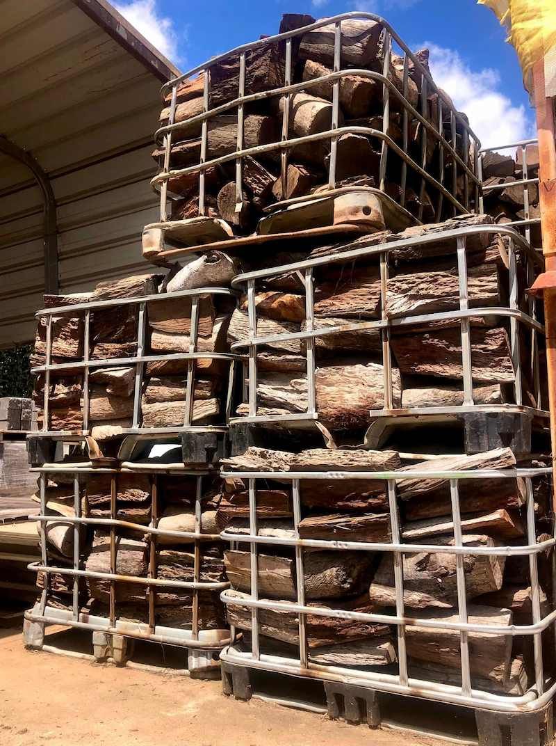 A Pile of Logs Stacked on Top of Each Other in Crates — Highfields Landscape Supplies In Meringandan, QLD