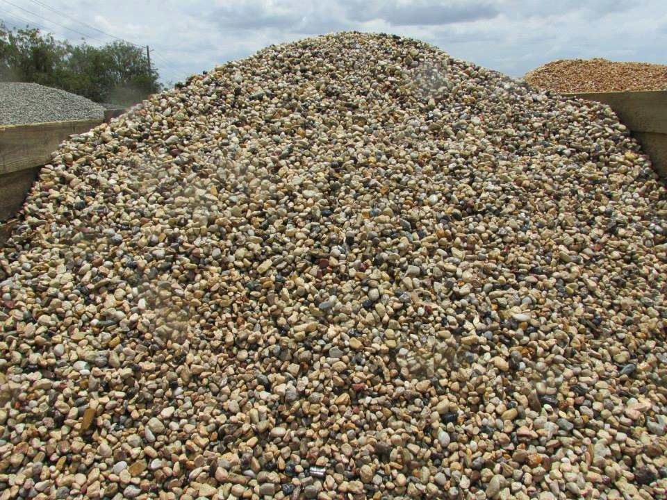 A Pile of Gravel is Sitting on Top of a Pile of Dirt — Highfields Landscape Supplies In Toowoomba, QLD