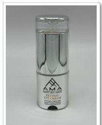 Silver cosmetic eye cream bottle with label; on a white background.