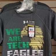 Dark gray Under Armour Eagles T-shirt with green and white “We Are Tech” text and eagle graphic on a hanger