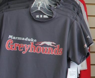 Gray T-shirt with “Marmaduke Greyhounds” text and a greyhound graphic on a hanger