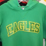 Green hoodie with yellow outlined “EAGLES” lettering on the front