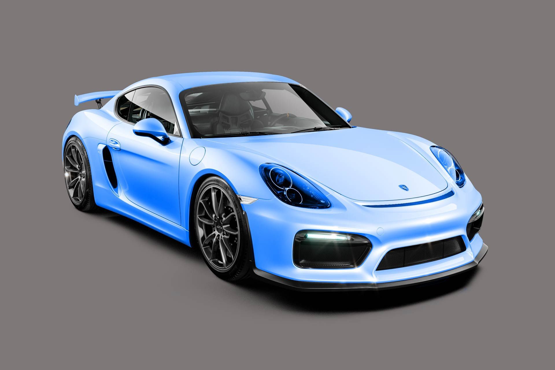 A blue porsche 911 gt4 rs is on a gray background.