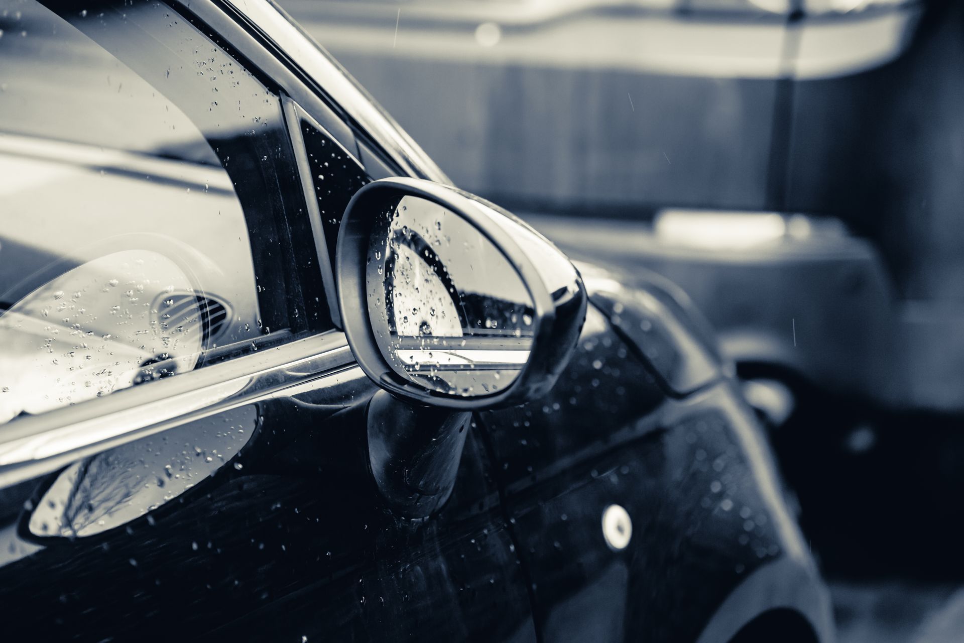 A close up of a car 's side view mirror