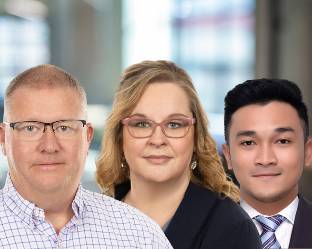 Three people, business portraits, blurred background, two wearing glasses.