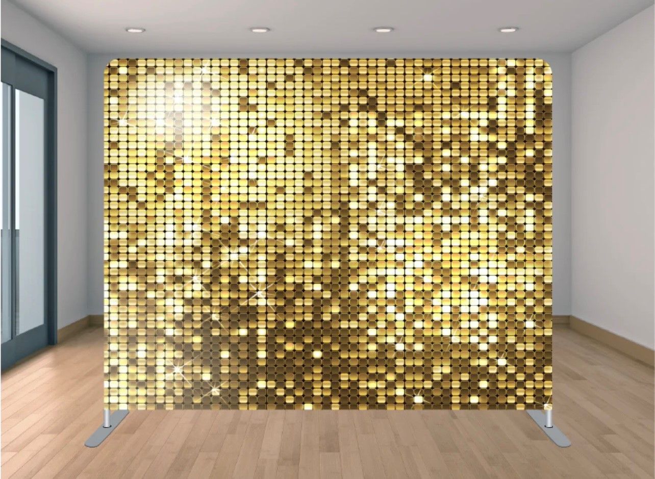 There is a gold sequined wall in the middle of a room.