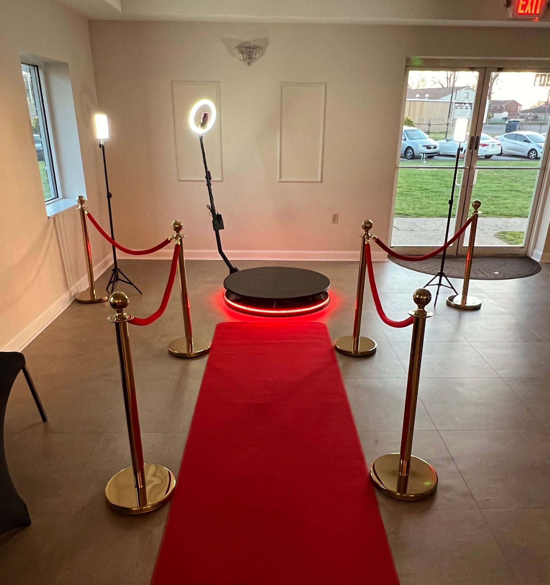 There is a red carpet in the middle of the room.