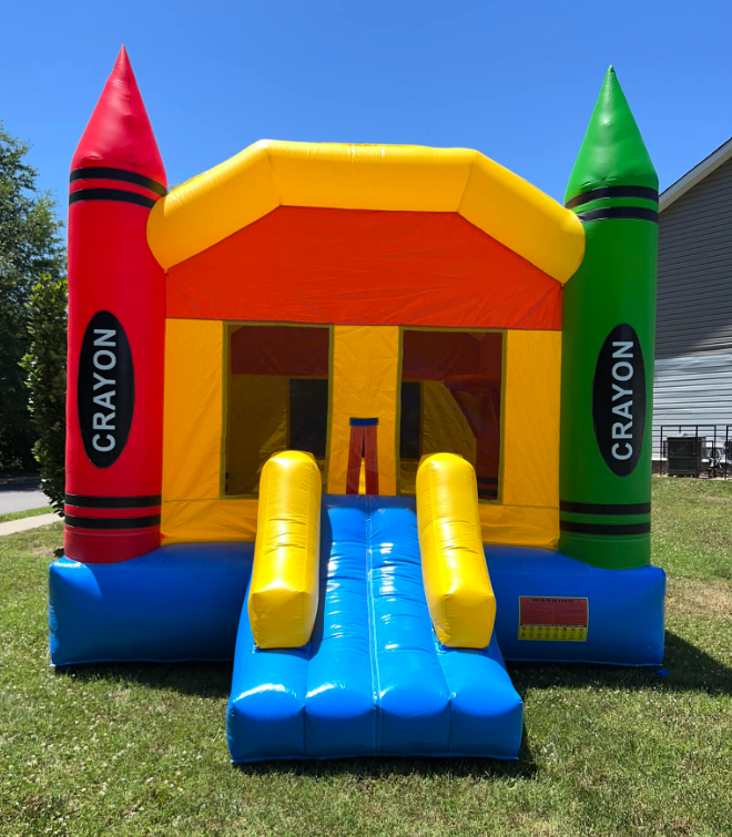 A bouncy house that looks like a crayon castle