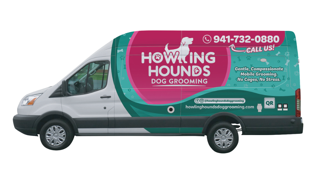 A white van with a pink and green wrap for howling hounds dog grooming.