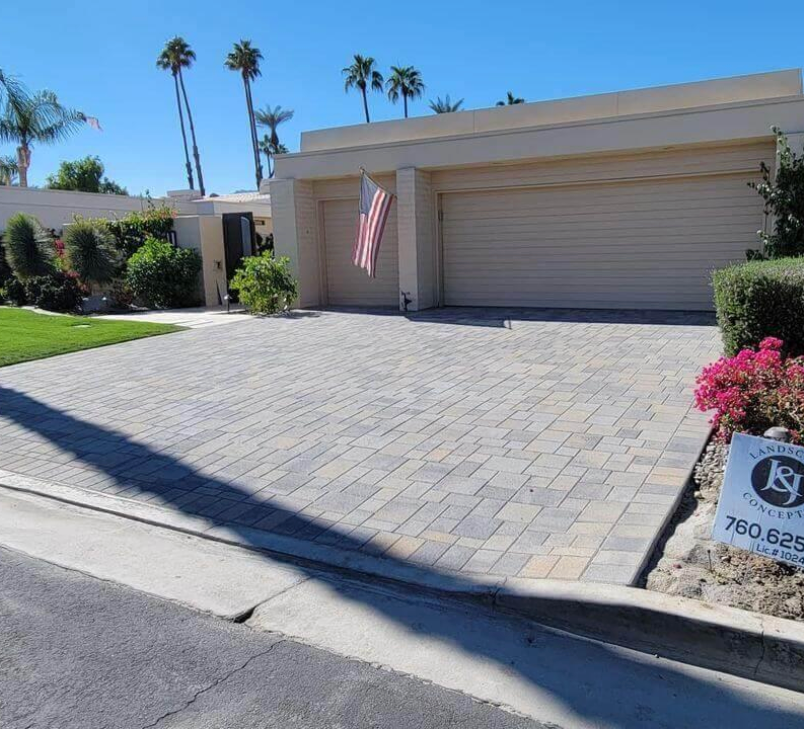 A driveway with a sign that says ks on it