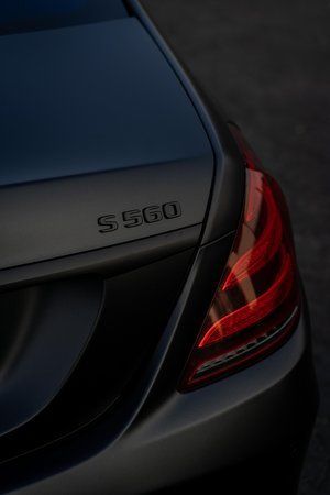 a close up of the back of a black mercedes benz s class .