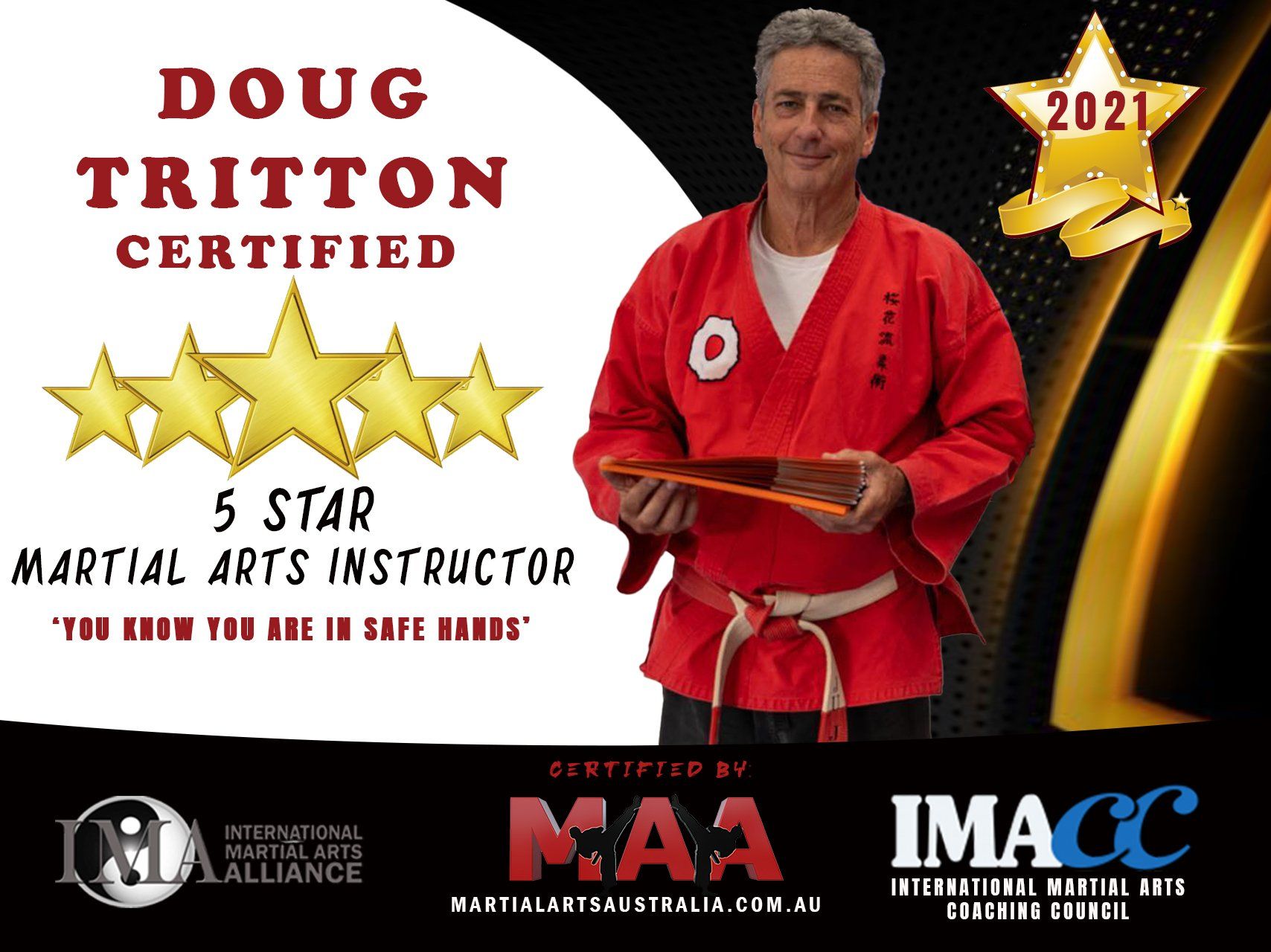 A man in a red karate uniform has been certified as a martial arts instructor