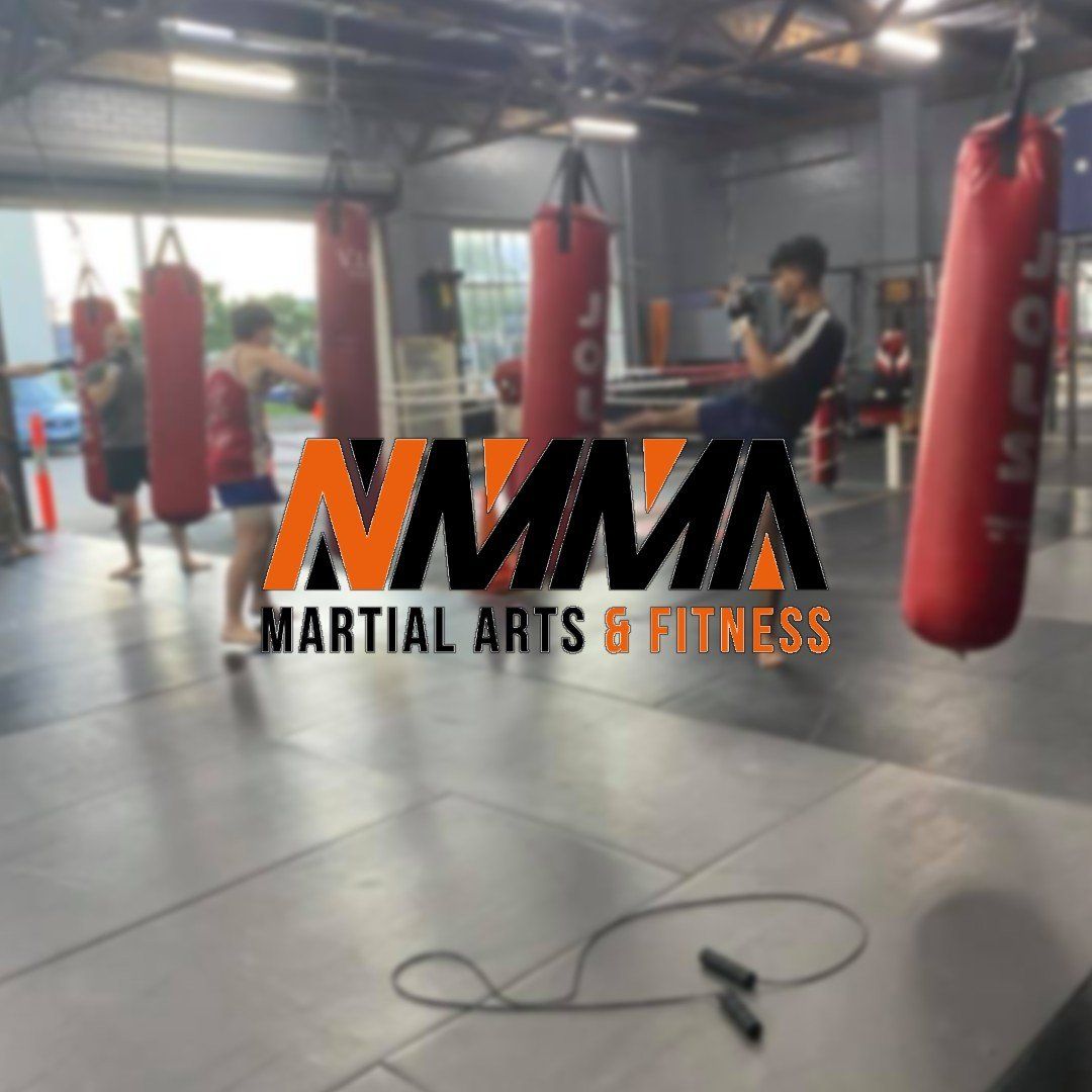 Mma martial arts and fitness logo on a gym floor