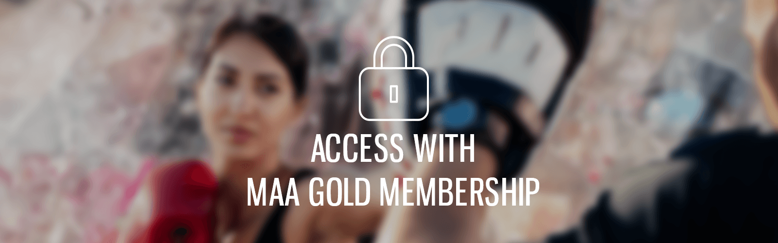 A blurred image of a man and woman with the words access with max gold membership