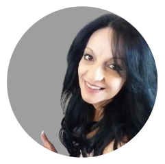 A woman with long black hair is smiling in a circle
