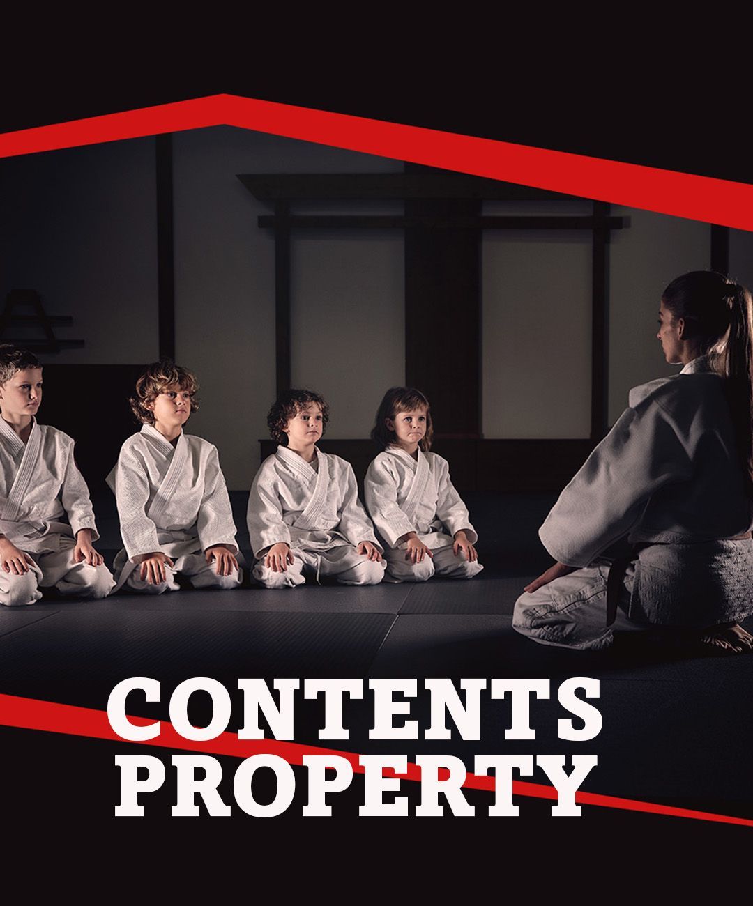 A group of children are sitting on the floor in a karate class.
