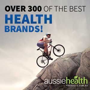 A person is riding a bike on top of a rock.