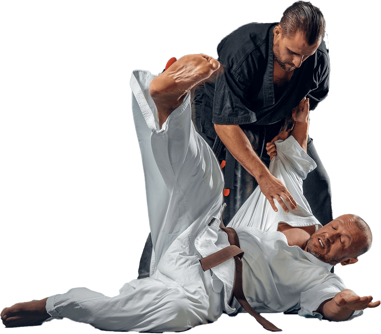 Two men are practicing martial arts on a white background.