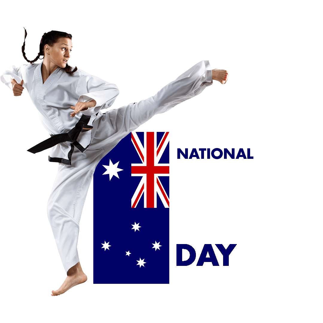 A woman in a karate uniform is kicking a british flag