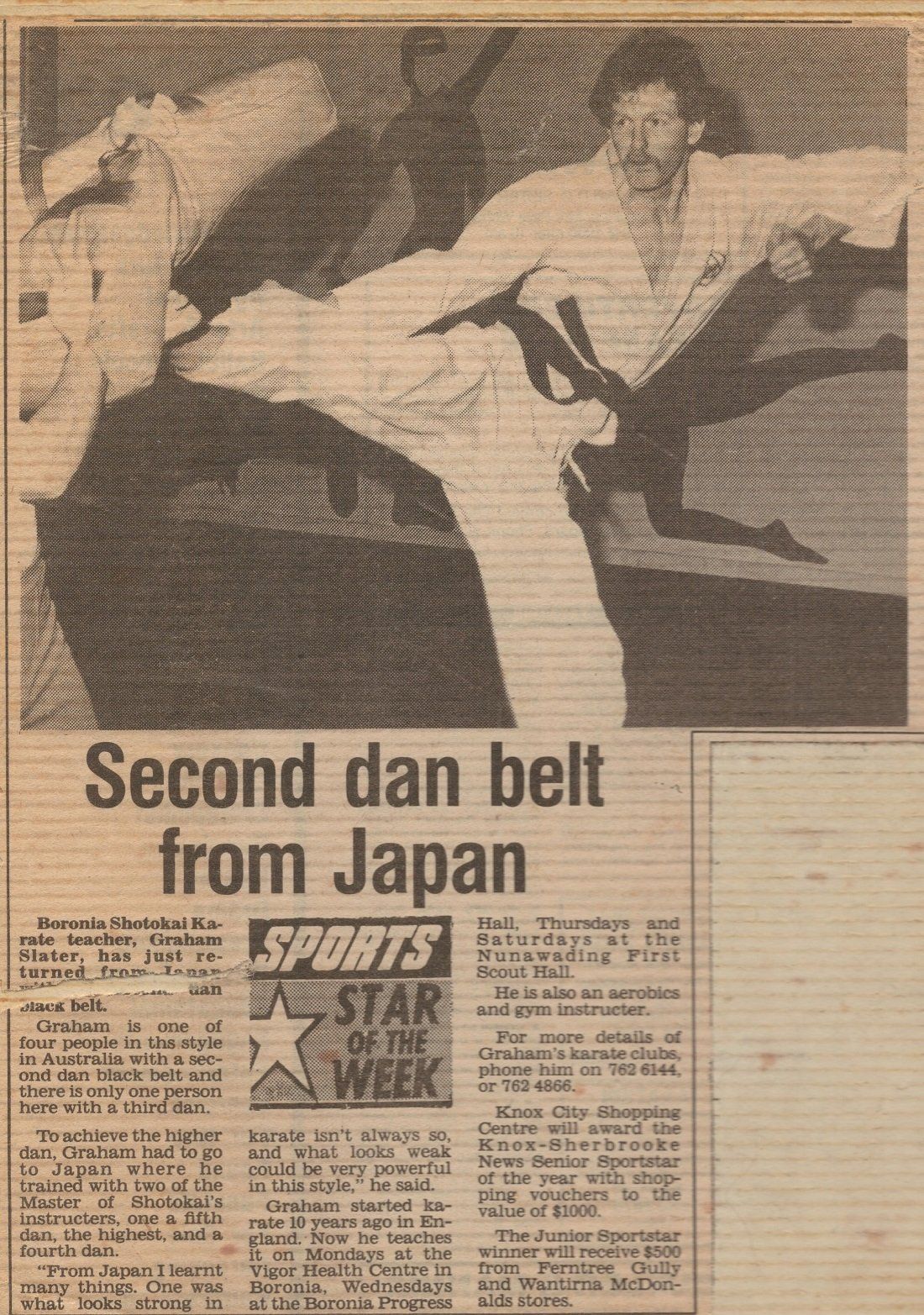 A newspaper article about a second dan belt from japan