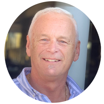 A man in a striped shirt is smiling in a circle