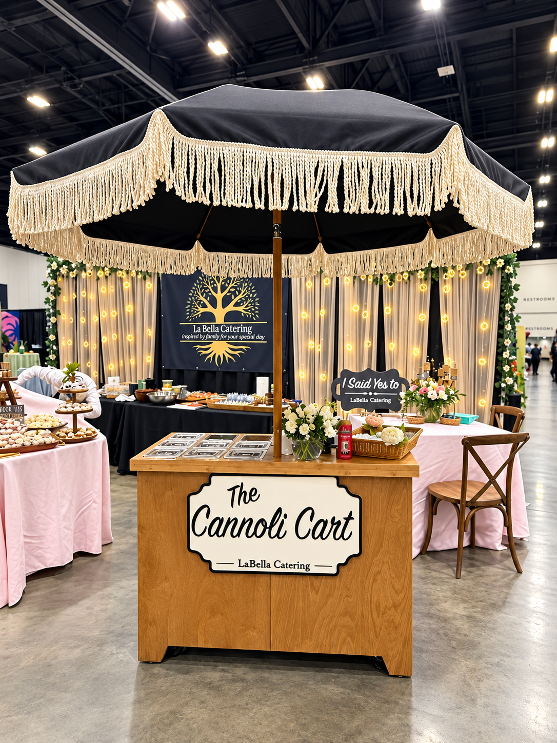 Cannoli being hand-filled at a styled cart display