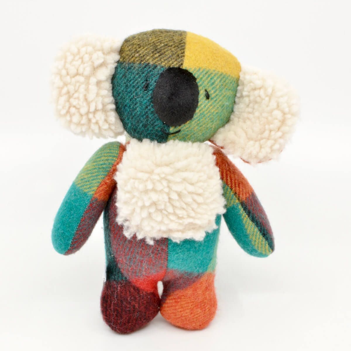 recycled fabric toy koala, with patchwork colours and fluffy white ears and belly