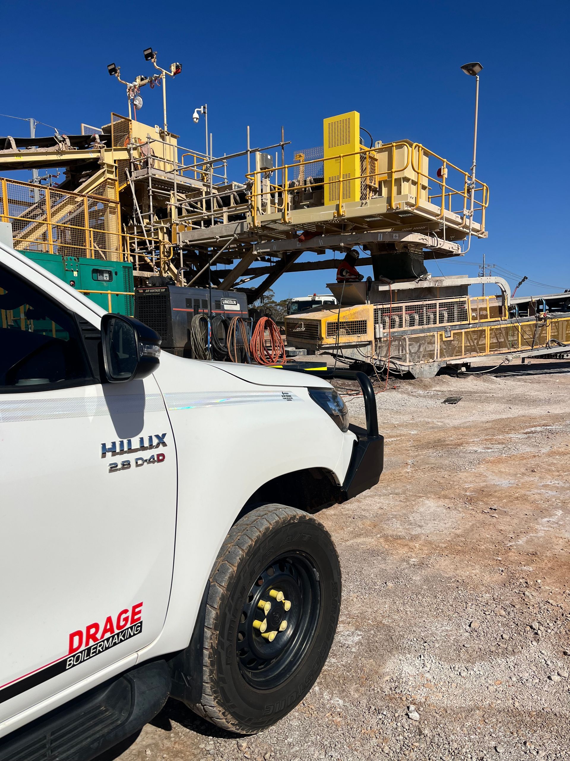 White Toyota Hilux truck with 