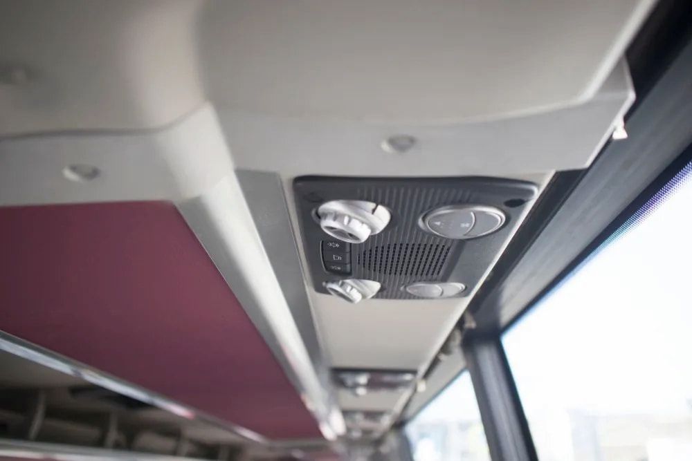 Overhead Bus Controls With Dials and Air Vents, Next to a Window — Cool Cars NT in Coolalinga, NT