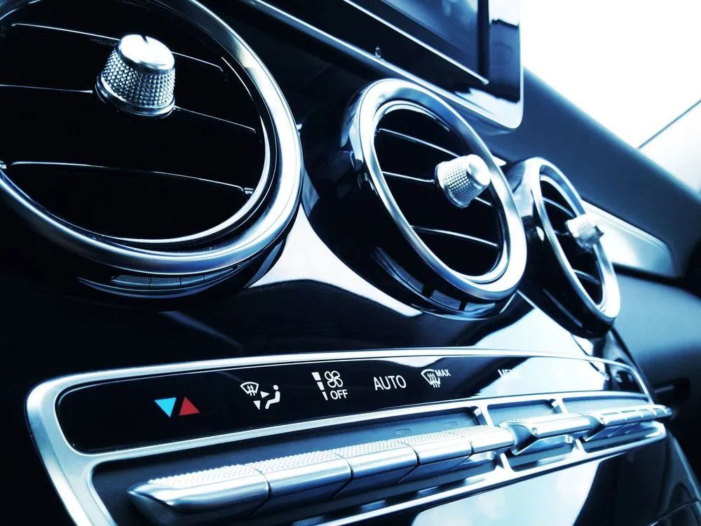Dashboard of a Luxury Car, Featuring Air Vents and Climate Control Buttons — Cool Cars NT in Anula, NT