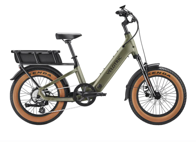 A red electric bike is sitting on a white background.