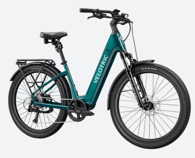 A red electric bike is sitting on a white background.