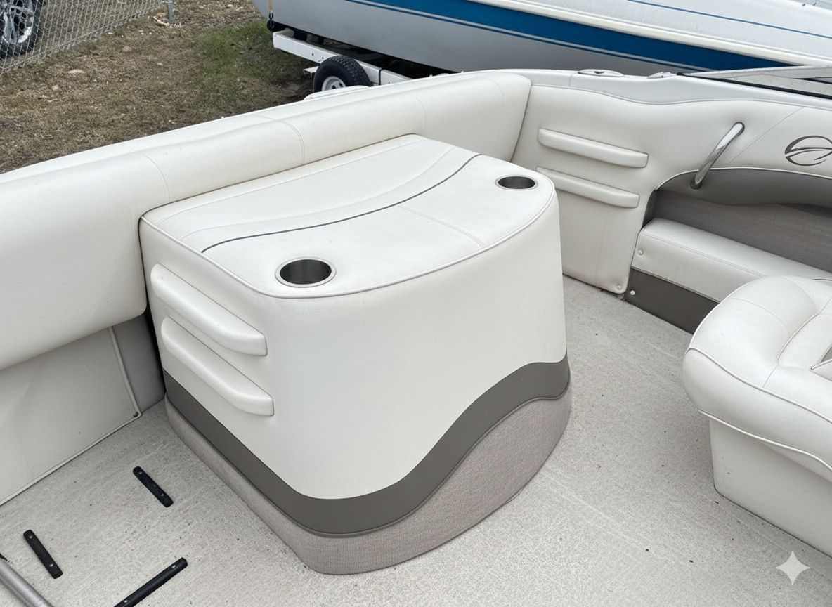 White boat seating with built-in cooler/storage compartment and cup holders on a pontoon deck