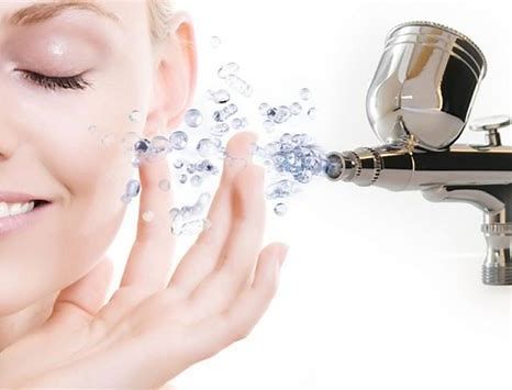 Woman washing face with water from a faucet and bubbles splashing